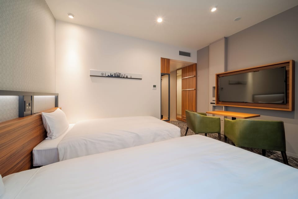 Twin Room, Non Smoking | Down comforters, laptop workspace, soundproofing, iron/ironing board