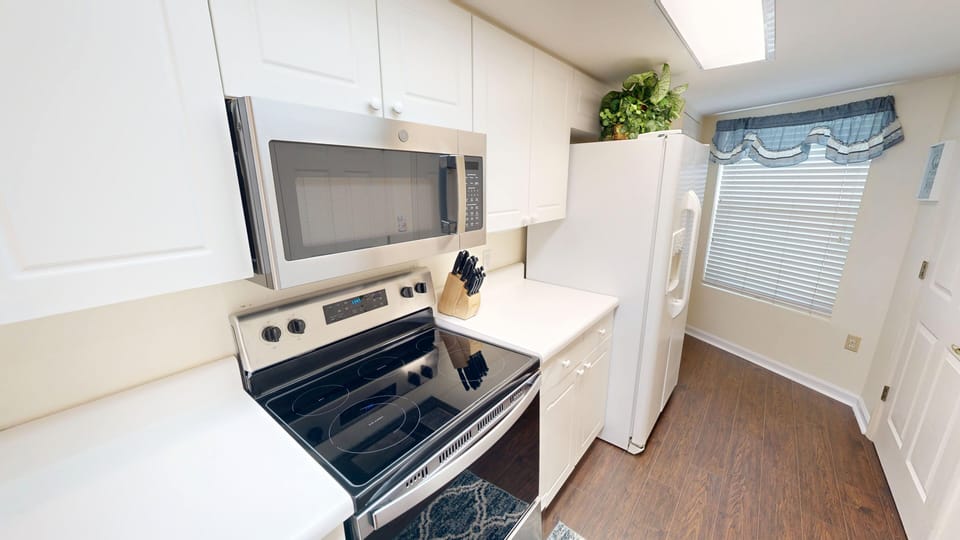Condo, 2 Bedrooms | Private kitchen | Fridge, coffee/tea maker, toaster