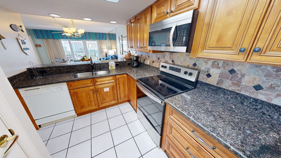 Condo, 2 Bedrooms | Private kitchen | Fridge, coffee/tea maker, toaster