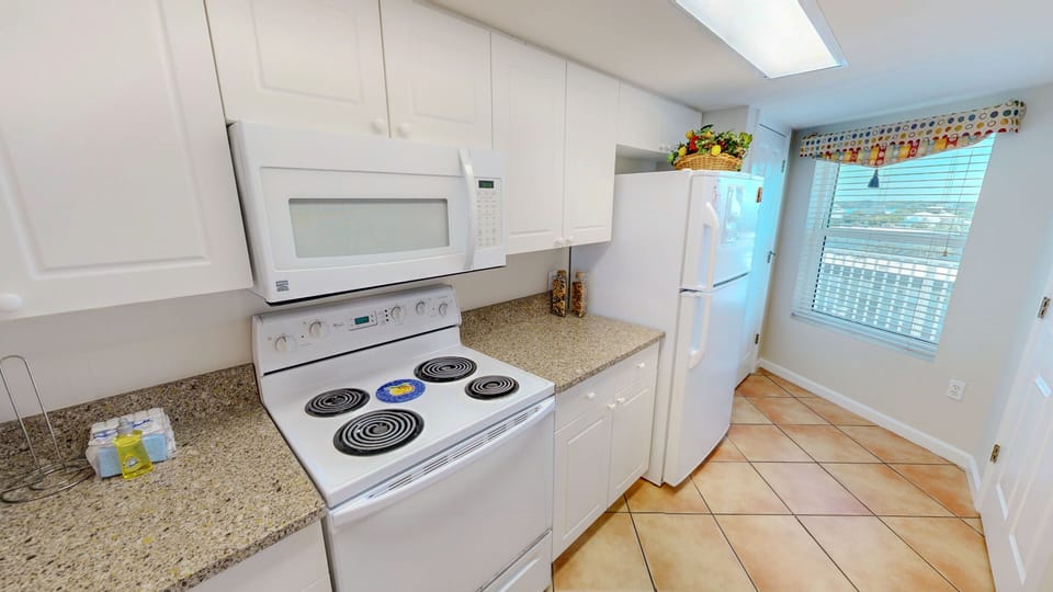Condo, 2 Bedrooms | Private kitchen | Fridge, coffee/tea maker, toaster