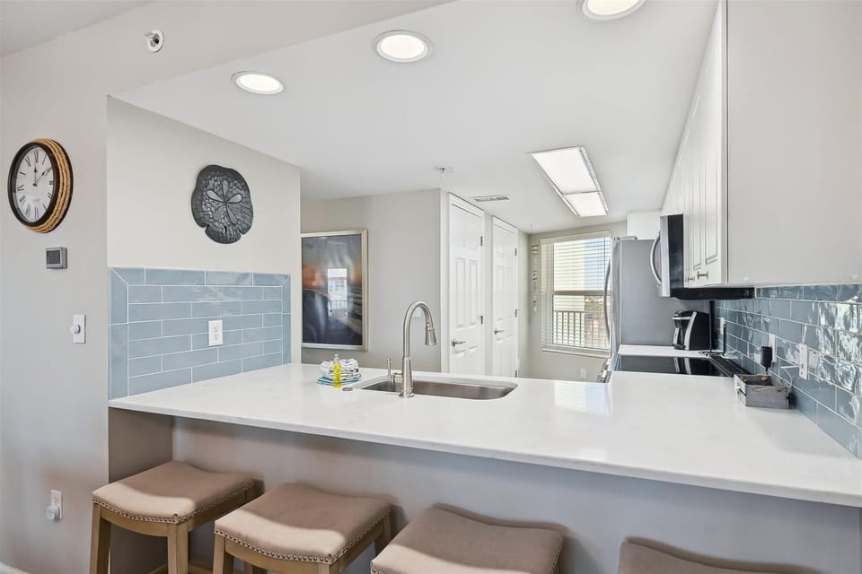 Condo, 3 Bedrooms | Private kitchen | Fridge, microwave, coffee/tea maker, toaster