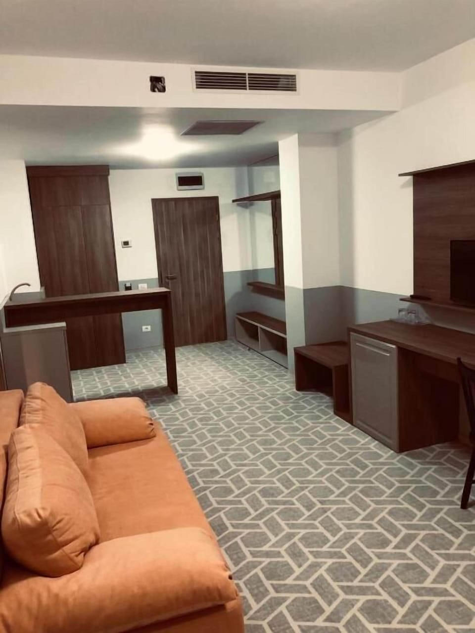 Suite, Balcony | Minibar, desk, laptop workspace, blackout drapes