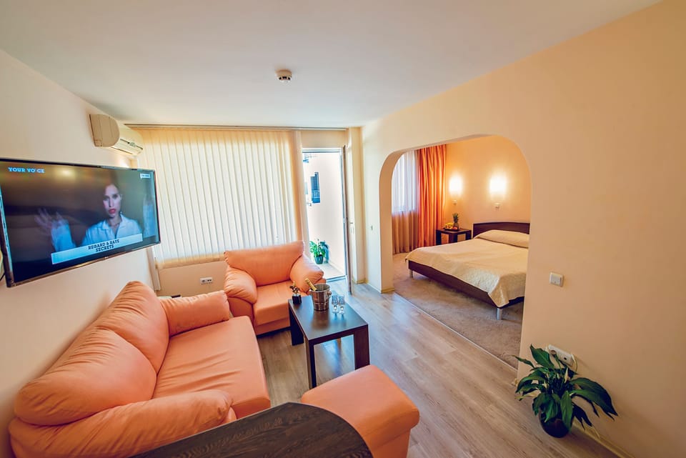 Studio, Balcony | Living area | Flat-screen TV