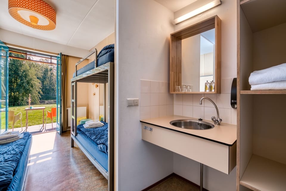 Family Quadruple Room, Patio | WiFi (free), bed sheets