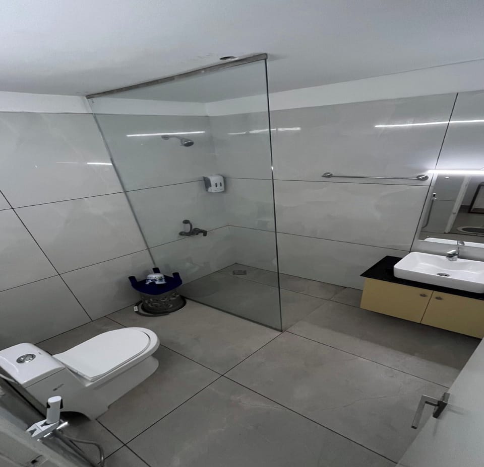 Deluxe Double Room | Bathroom | Shower, rainfall showerhead, towels, soap