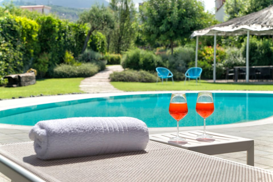 Seasonal outdoor pool, pool umbrellas, sun loungers