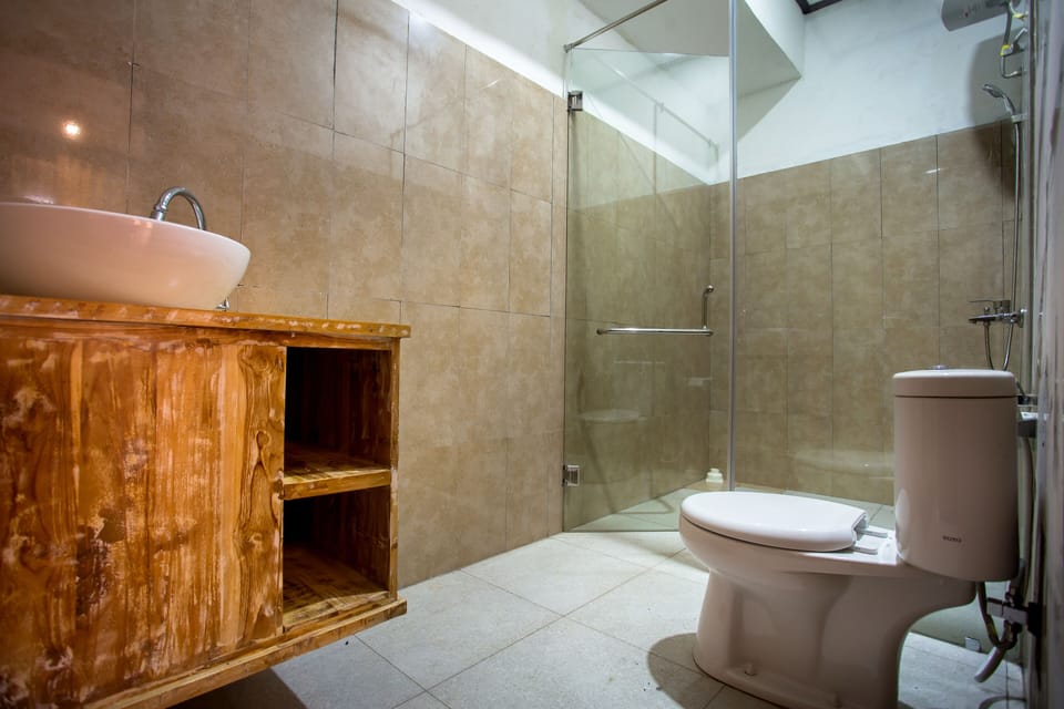 Bungalow, Sea View | Bathroom | Shower, free toiletries, hair dryer, bathrobes