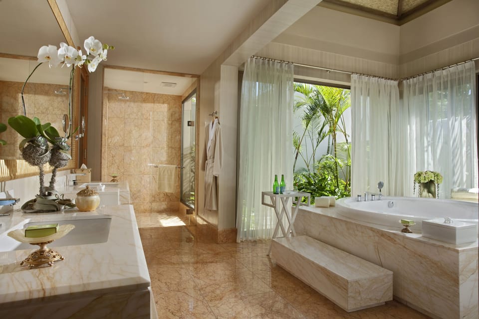 Separate tub and shower, jetted tub, rainfall showerhead