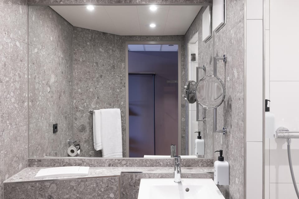Shower, rainfall showerhead, eco-friendly toiletries, hair dryer
