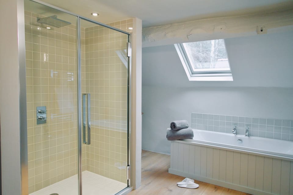 The Trefaldwyn (Super King) | Bathroom | Separate tub and shower, rainfall showerhead, designer toiletries