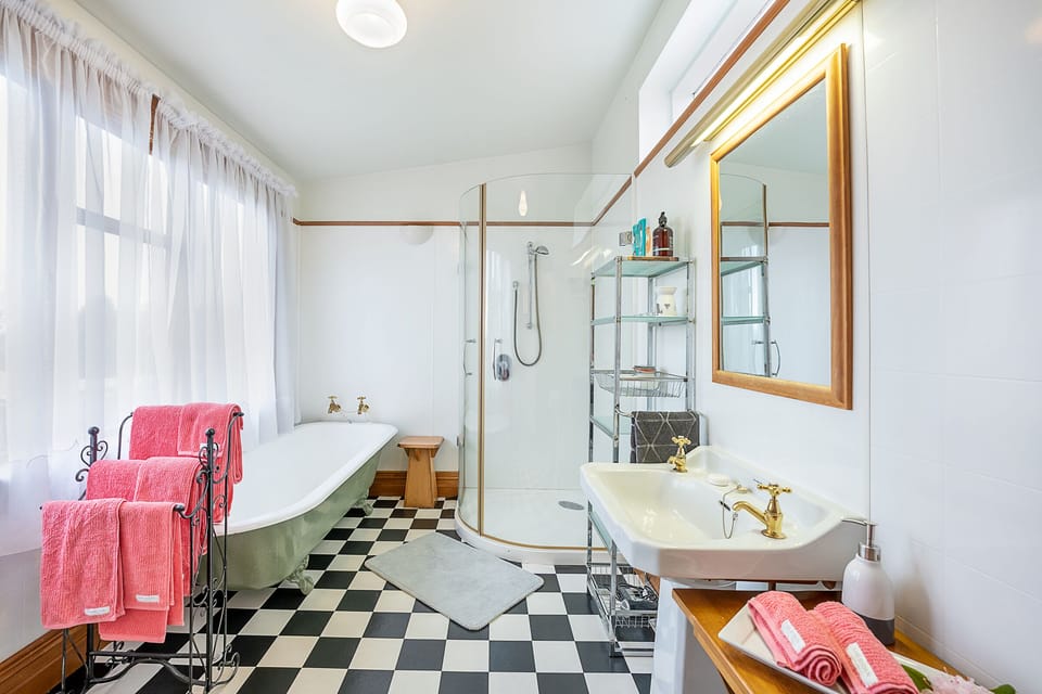 Luxury Room (McSkimmings Suite) | Bathroom | Hair dryer, bathrobes, towels, soap