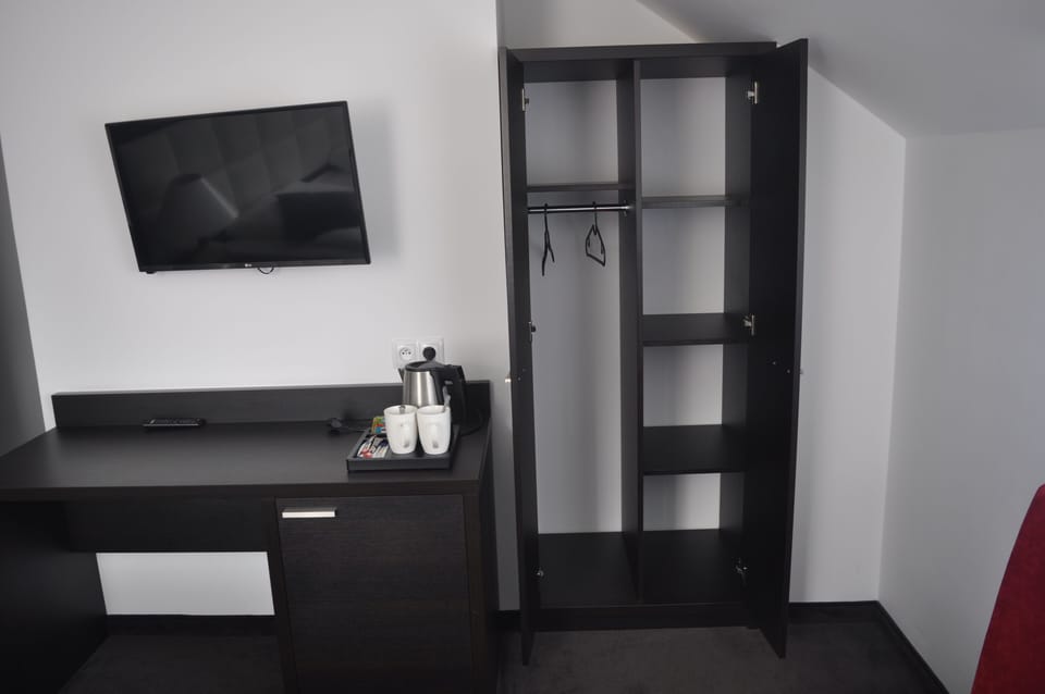 Standard Double Room | Living area | 28-inch LCD TV with satellite channels, TV