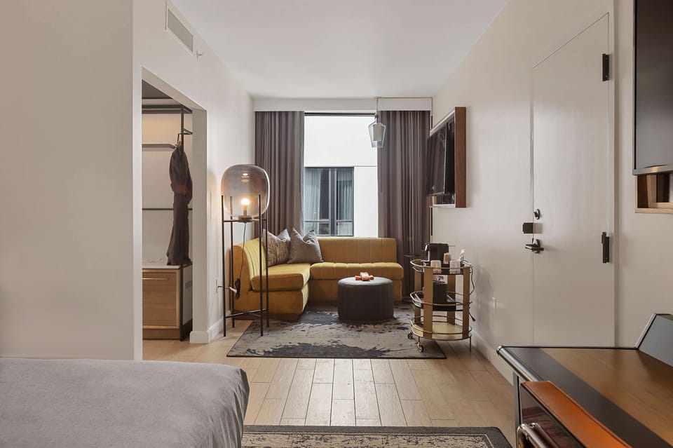 Deluxe Room, 1 King Bed | Living area | 47-inch flat-screen TV with digital channels, TV