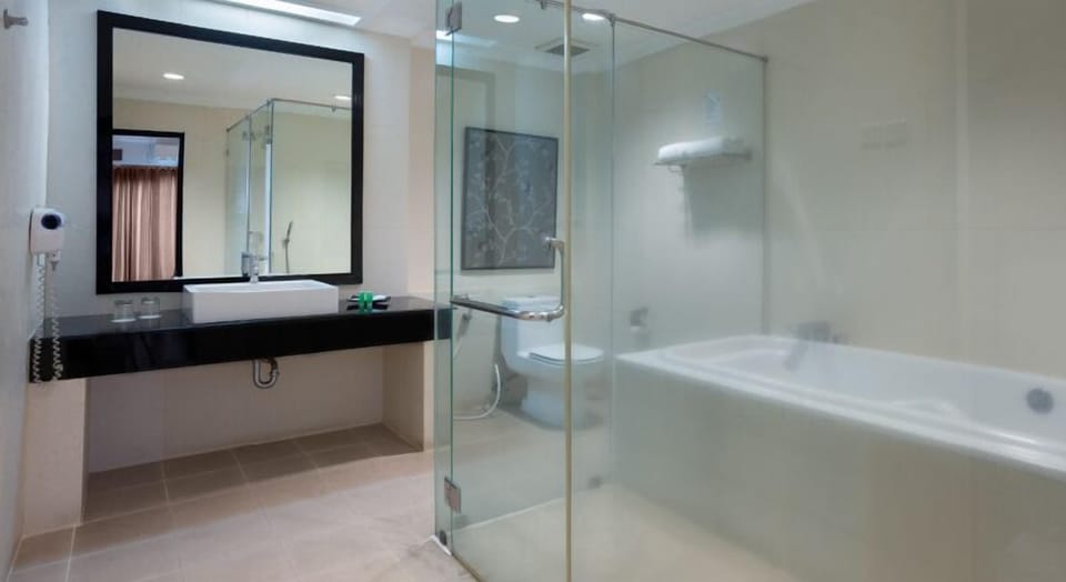 Suite | Bathroom | Shower, slippers, towels