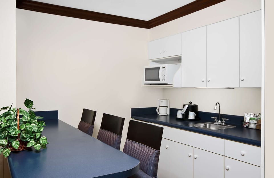 Suite, 1 King Bed, Jetted Tub | Private kitchen | Fridge, microwave, coffee/tea maker