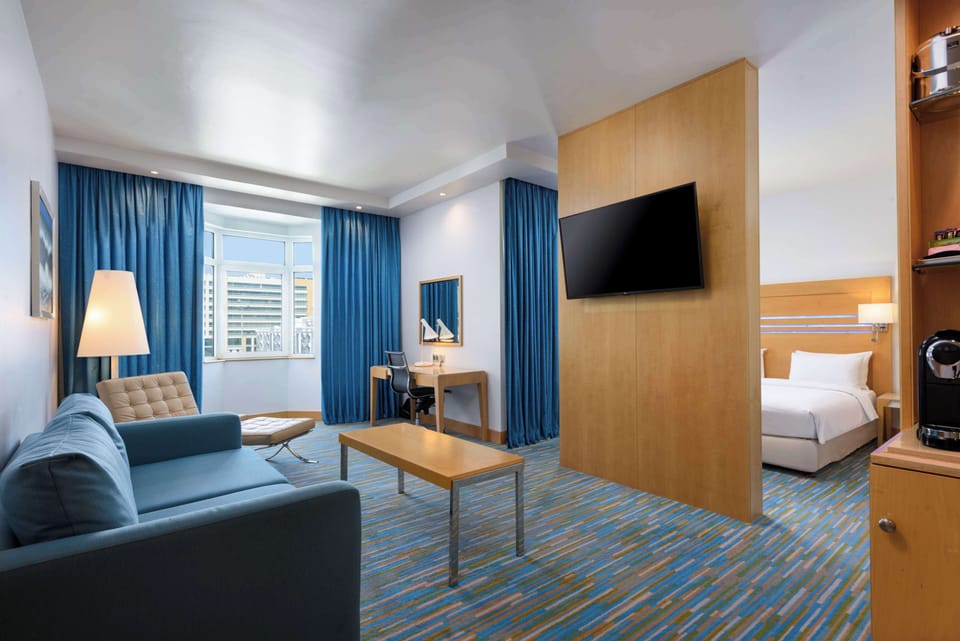 Down comforters, minibar, in-room safe, desk