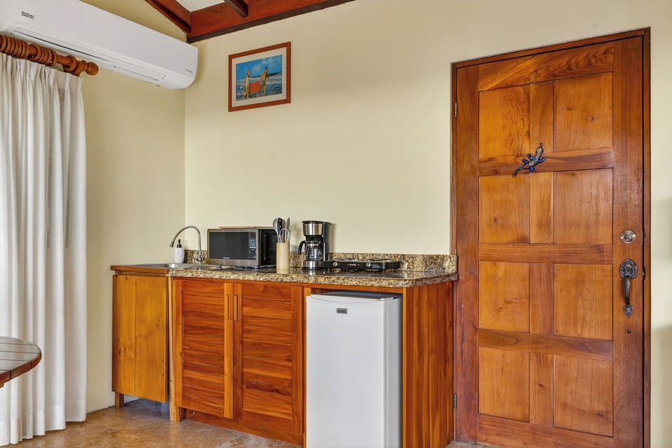 Villa | Private kitchen | Mini-fridge, microwave, stovetop, coffee/tea maker