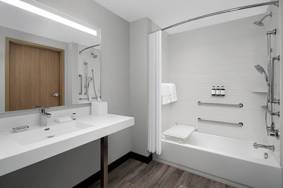 Shower, hydromassage showerhead, designer toiletries, hair dryer
