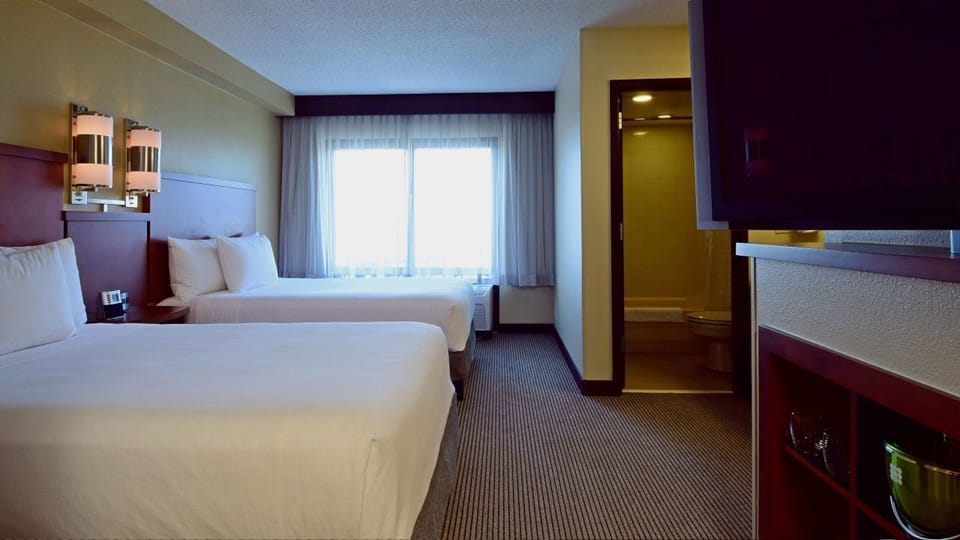Premium bedding, down comforters, desk, laptop workspace
