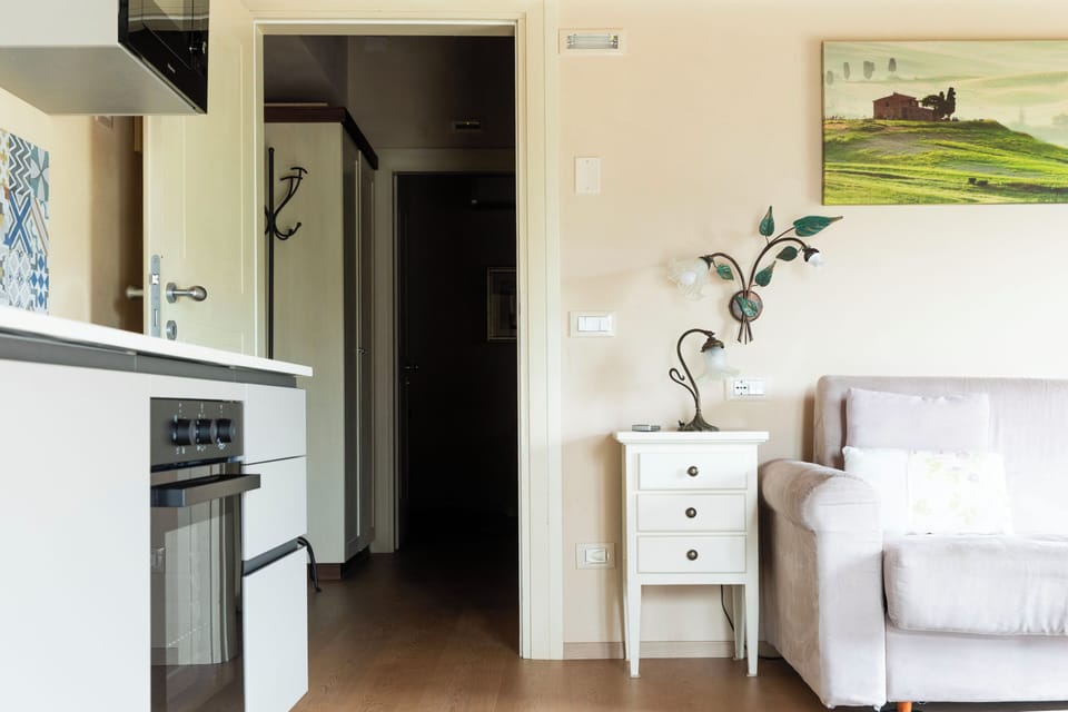 Deluxe Apartment, 1 Bedroom, Hill View (La Terrazza) | Living area | 32-inch flat-screen TV with satellite channels, TV, toys