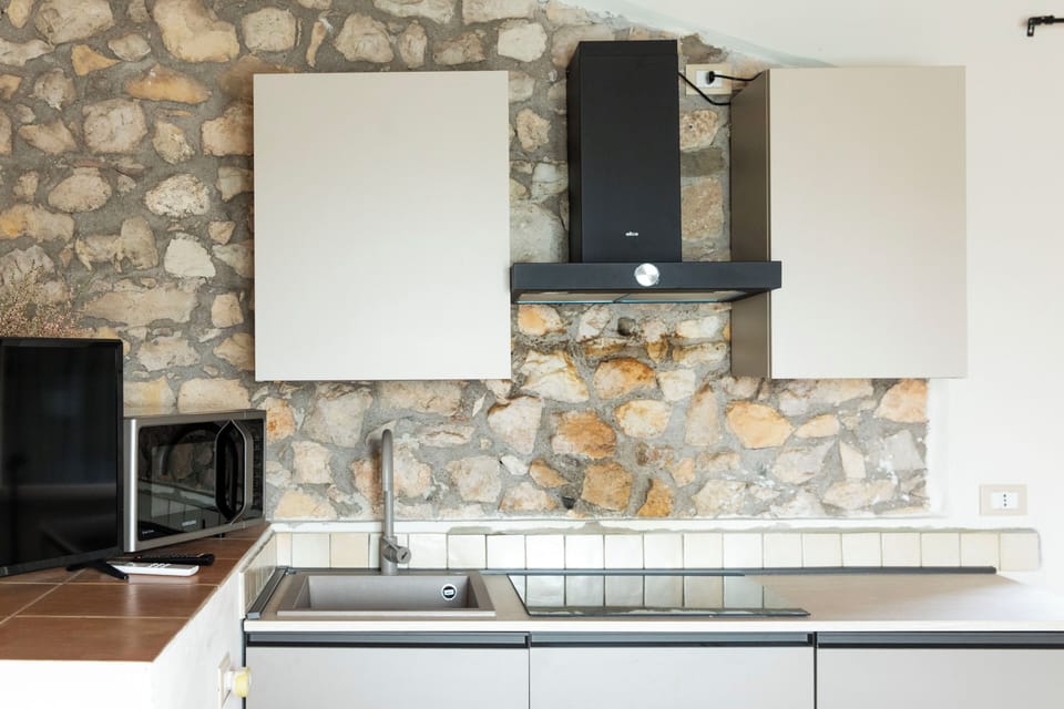 Superior Apartment, 1 Bedroom (Il Fienile) | Private kitchen | Fridge, microwave, stovetop, coffee/tea maker