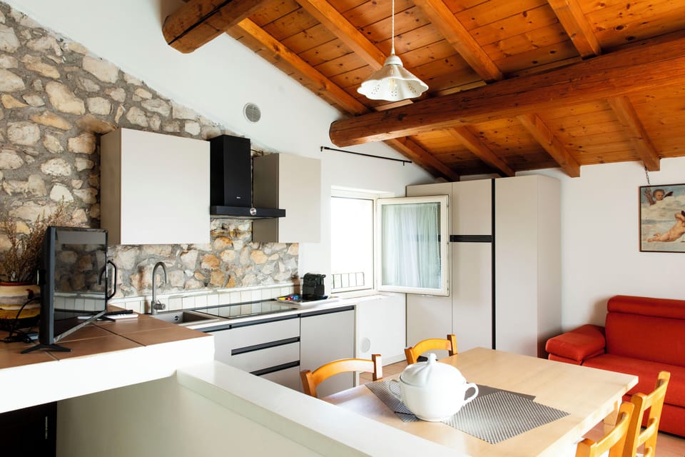 Superior Apartment, 1 Bedroom (Il Fienile) | Living area | 32-inch flat-screen TV with satellite channels, TV, toys