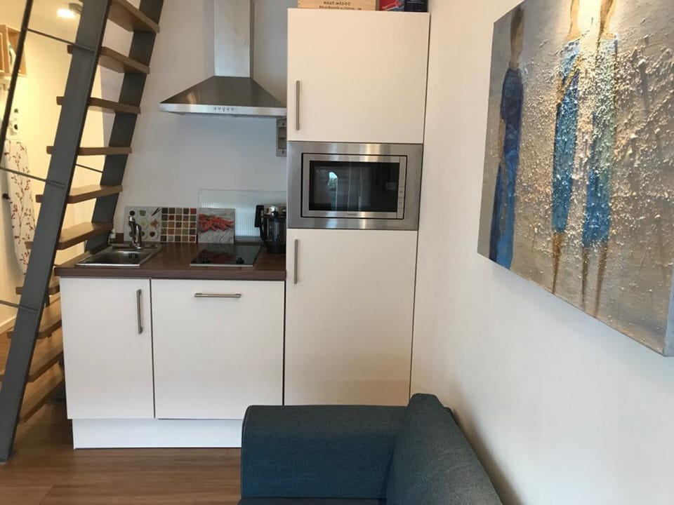 Apartment, 1 Bedroom, Balcony, Mezzanine (Wolke 9) | Private kitchenette | Fridge, microwave, stovetop, dishwasher