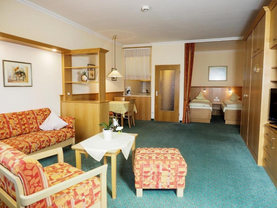 Comfort Apartment | Living area | Flat-screen TV