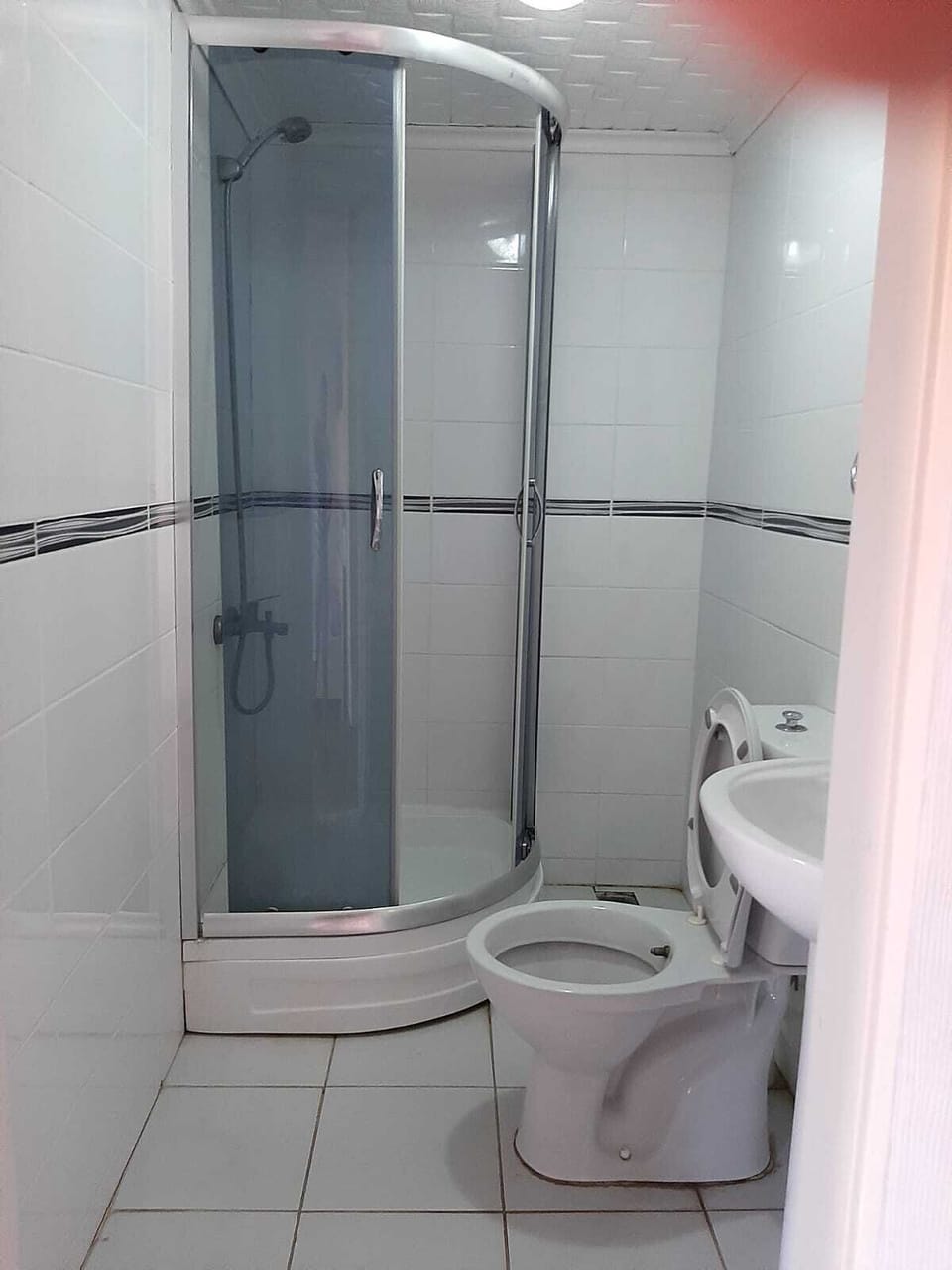 Shower, hydromassage showerhead, towels, soap