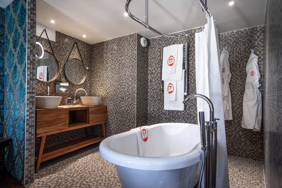 Shower, free toiletries, hair dryer, bathrobes