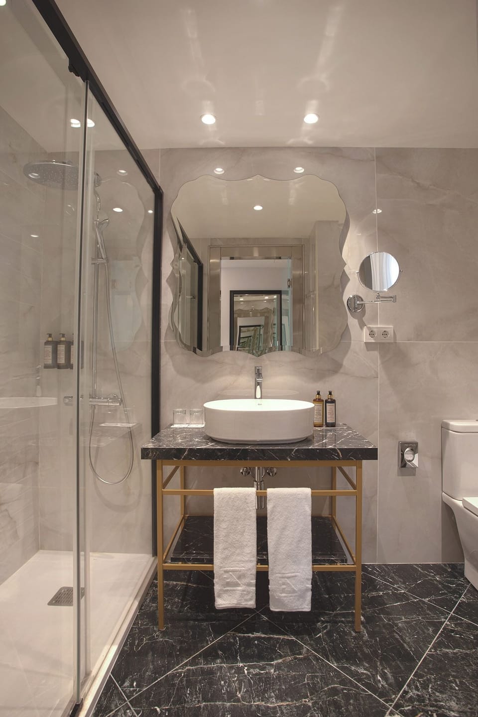 Shower, eco-friendly toiletries, hair dryer, towels