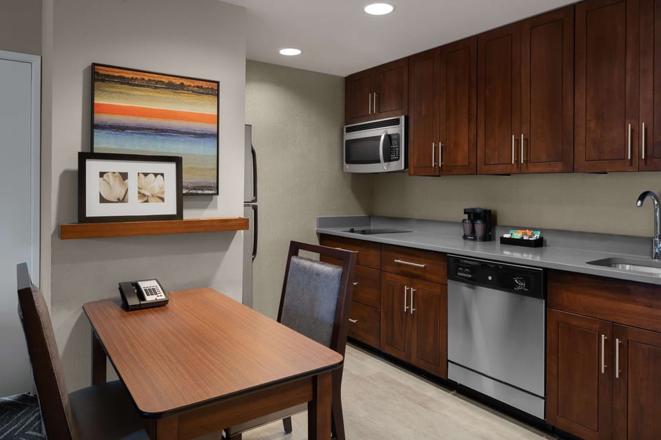 Suite, 1 King Bed, Non Smoking, Corner | Private kitchen | Coffee/tea maker, fridge, microwave, oven