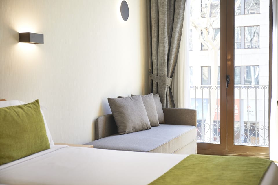 Hypo-allergenic bedding, down comforters, minibar, in-room safe