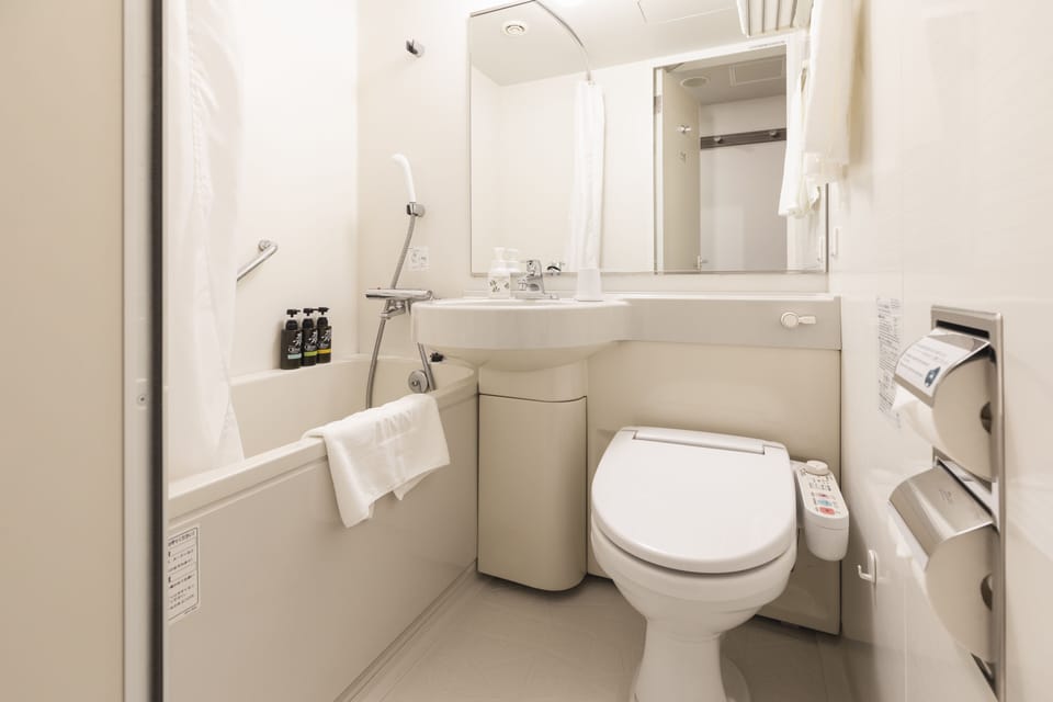 Combined shower/tub, free toiletries, hair dryer, bathrobes