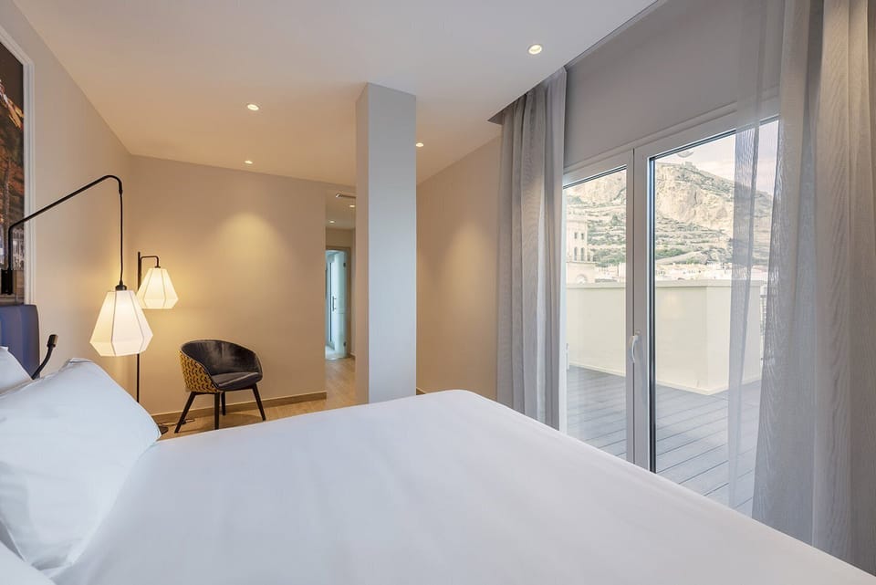 Premium bedding, down comforters, memory foam beds, minibar