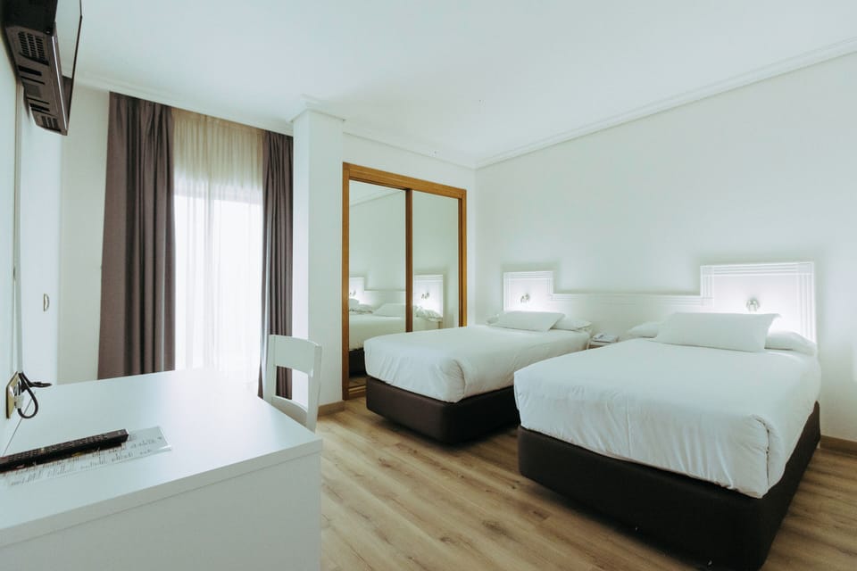 Double Room, Twin Beds | Down comforters, desk, laptop workspace, free WiFi