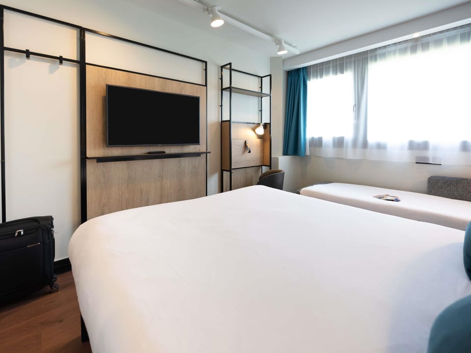 Triple Room (1 Double Bed and 1 Single Sofa Bed) | In-room safe, desk, blackout drapes, soundproofing