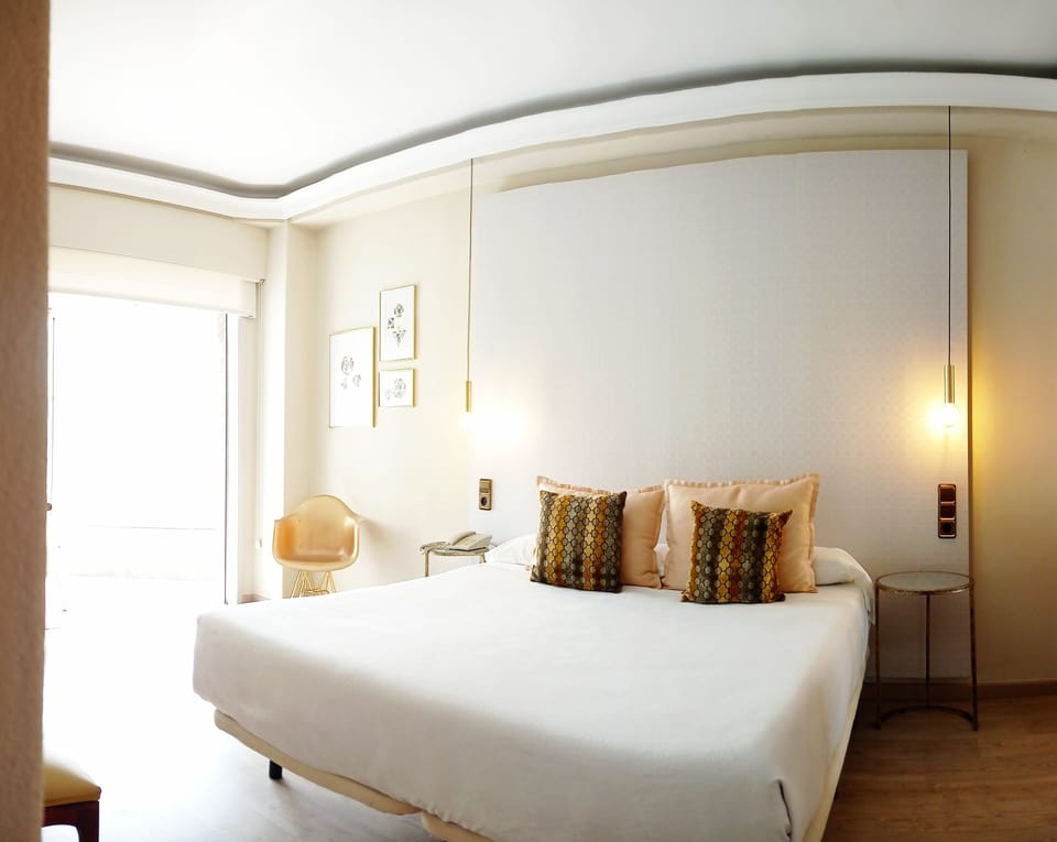 Superior Double Room | Minibar, in-room safe, desk, laptop workspace
