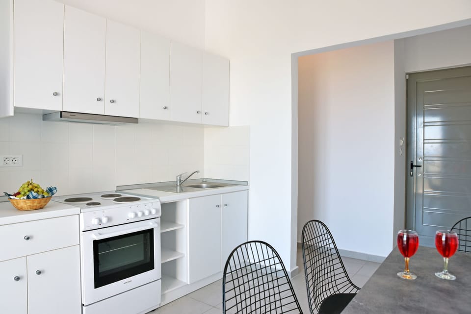 Suite, 2 Bedrooms, Sea View | Private kitchen | Fridge