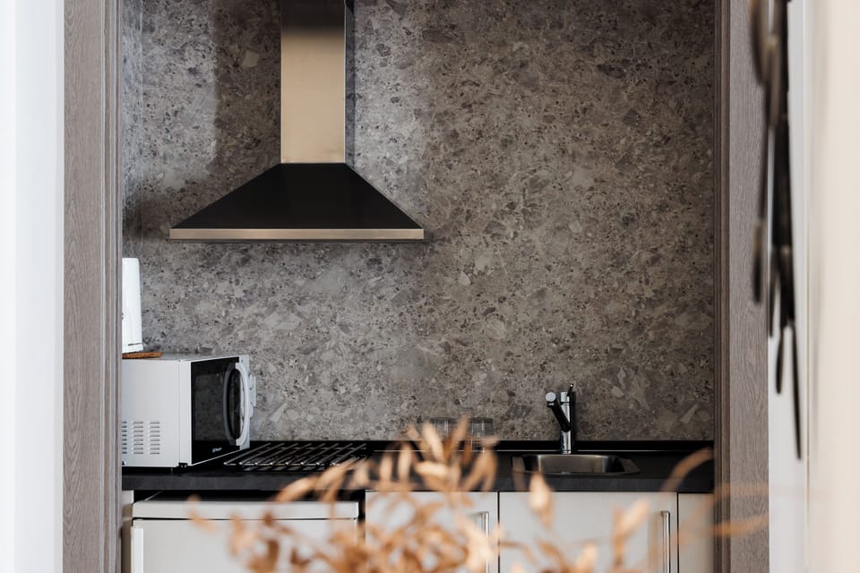 Fridge, microwave, stovetop, coffee/tea maker