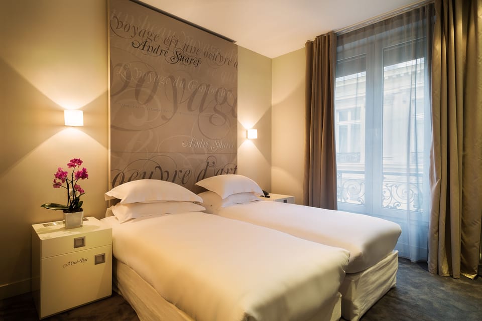 Superior Double or Twin Room | Minibar, in-room safe, desk, laptop workspace