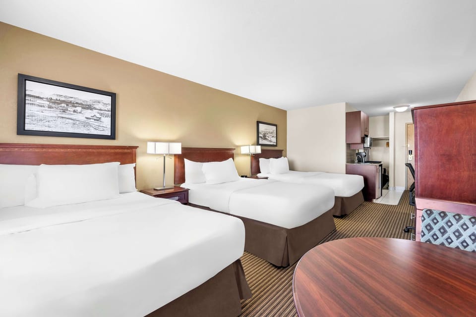 Standard Room, Multiple Beds, Non Smoking, Refrigerator & Microwave | Desk, laptop workspace, blackout drapes, iron/ironing board