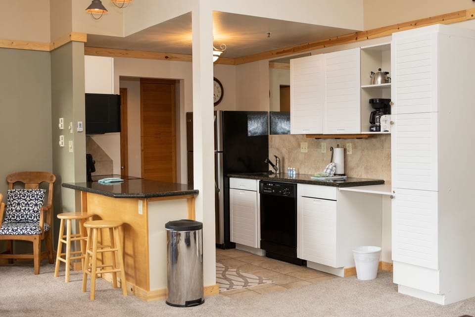 Condo, 2 Bedrooms | Private kitchen | Fridge, microwave, oven, dishwasher