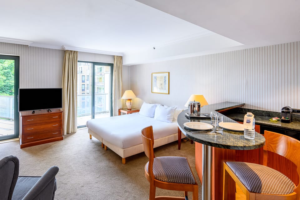 Studio, Balcony (Double Bed) | In-room safe, individually decorated, individually furnished, desk