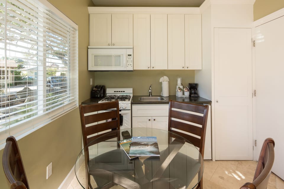 Deluxe Room, 2 Queen Beds | Private kitchen | Fridge, microwave, coffee/tea maker
