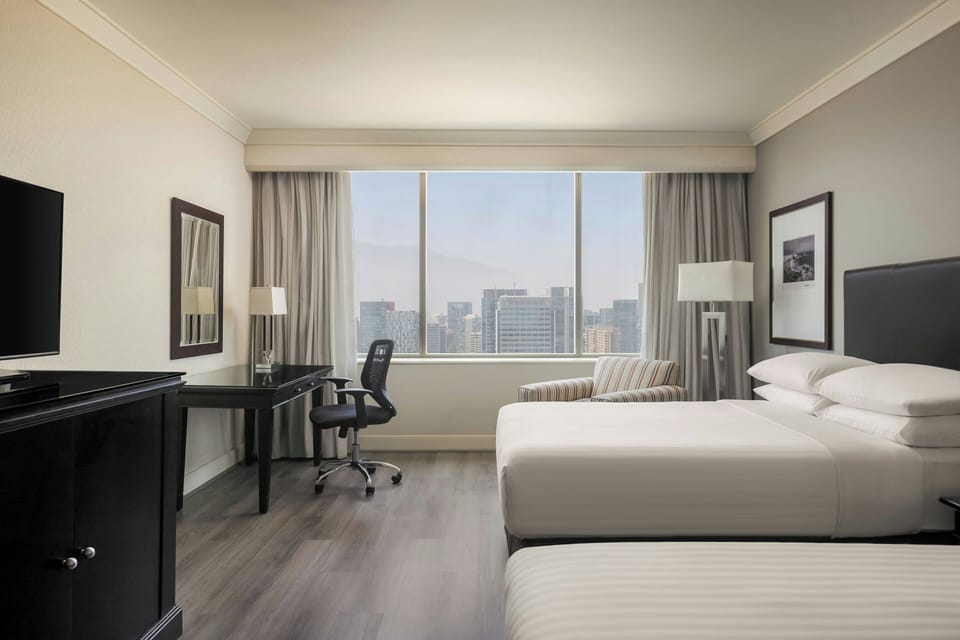 Hypo-allergenic bedding, minibar, in-room safe, desk