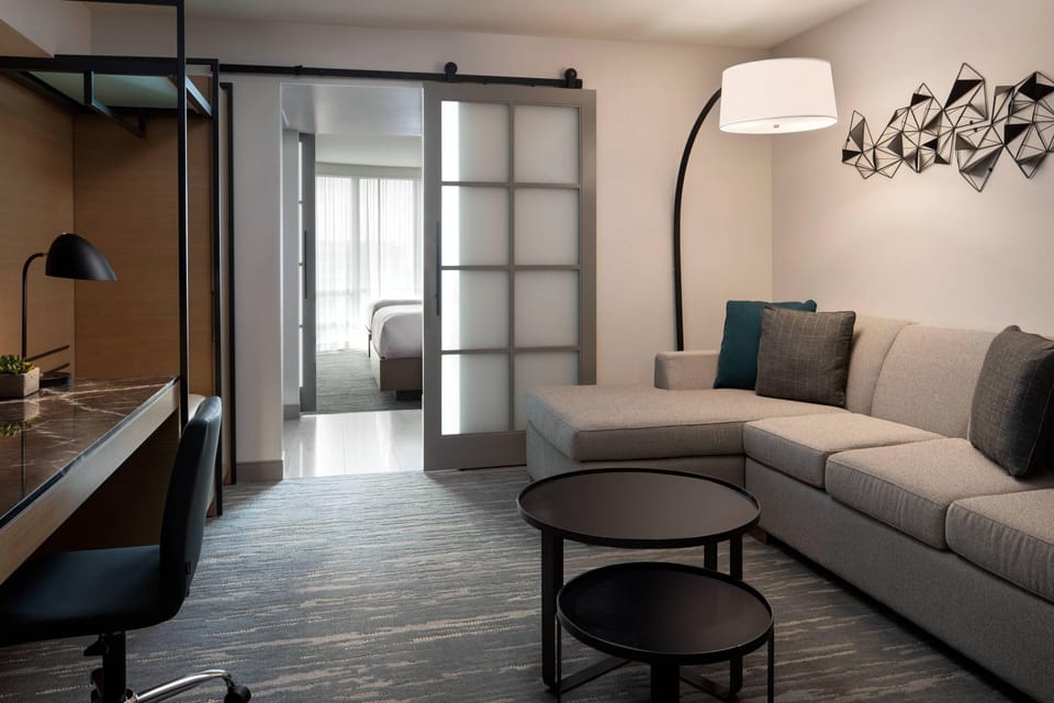 Junior Suite, Multiple Beds | Living area | 37-inch flat-screen TV with cable channels, TV, pay movies