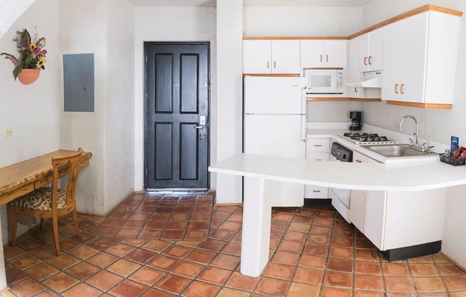 Suite, 2 Queen Beds | Private kitchen | Fridge, stovetop, coffee/tea maker