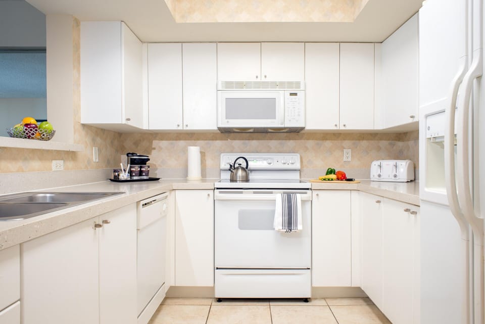 Fridge, microwave, coffee/tea maker, paper towels