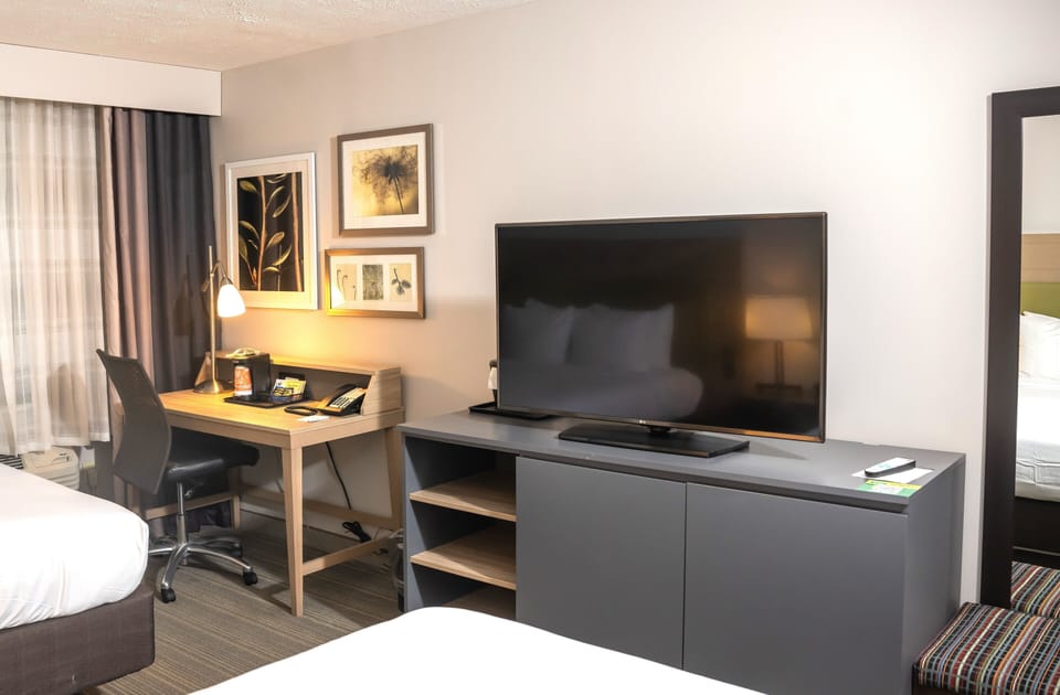 Room, 2 Queen Beds, Non Smoking | Hypo-allergenic bedding, desk, laptop workspace, iron/ironing board